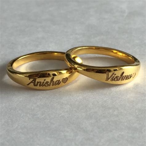 Unisex-Adult 24k Gold Plating and Laser Engraved Finish Customized Personalized Brass Adjustable Two Name Ring. . Name engraved ring